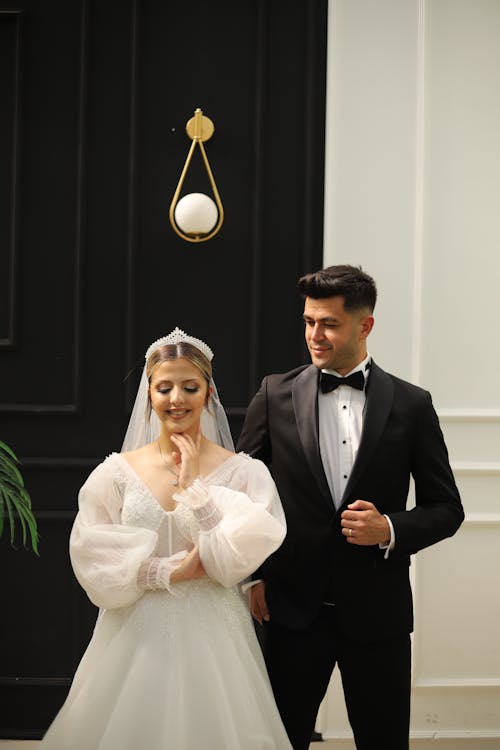 Newlyweds in Suit and Wedding Dress