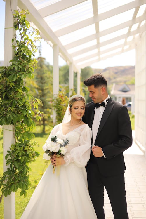 Smiling Newlyweds Posing Together