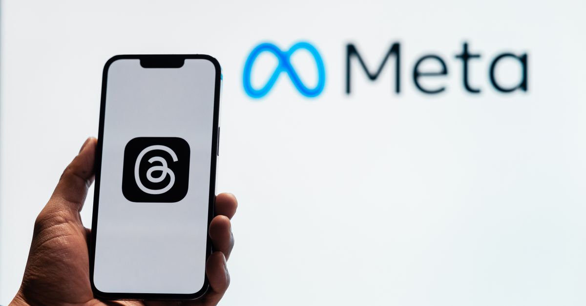 A digital mob of faceless avatars holding phones like pitchforks