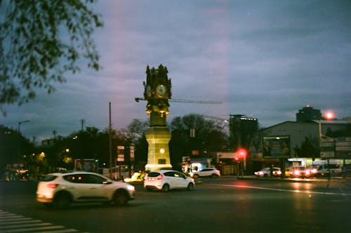 View of Cars Driving near the Historical Clock Tower in Ulus, Ankara, Turkey