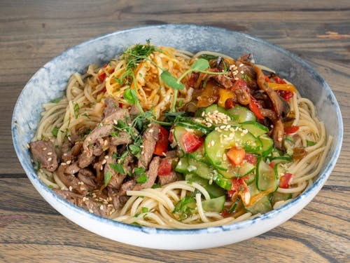 Close-up of a Healthy Pasta Dish with Meat and Vegetables