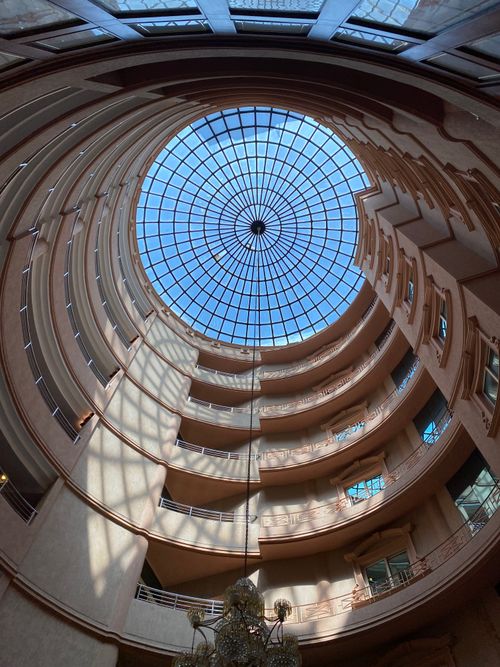 Free Impressive spiral atrium interior with a glass ceiling in Taif, Saudi Arabia, showcasing modern architecture. Stock Photo