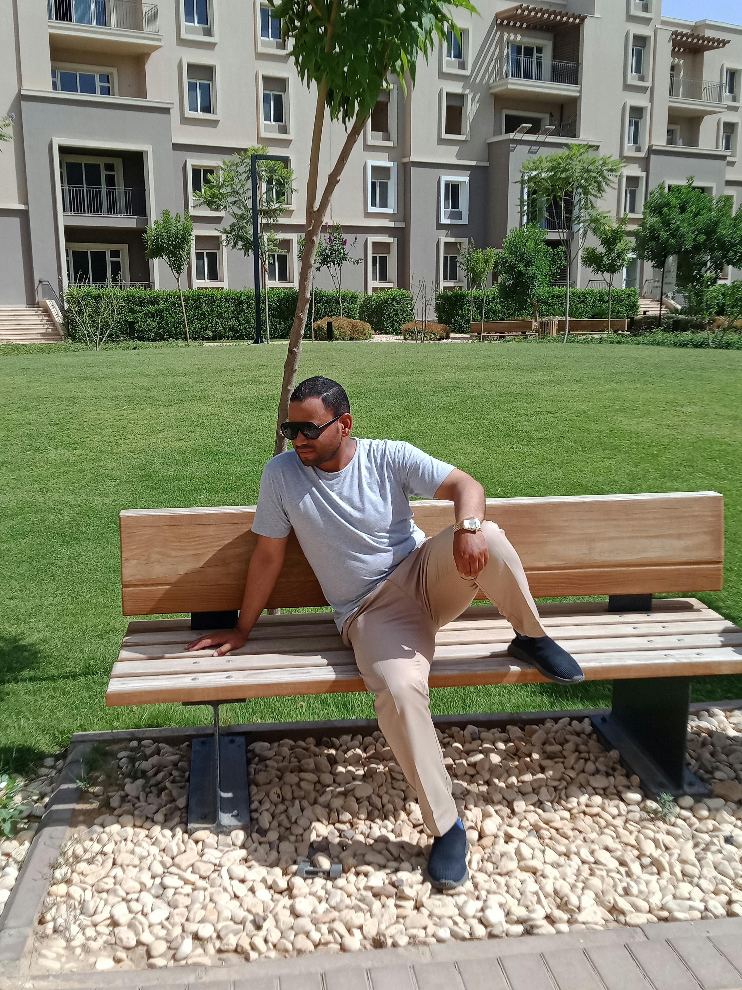 Luxury yacht cruising the Deep Sea near Dubai coastline with city skyline in the background.