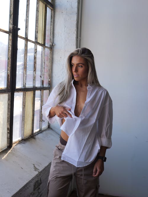 Blonde in White Blouse and Cargo Pants