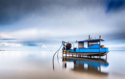 Free cinematic view with boat Stock Photo