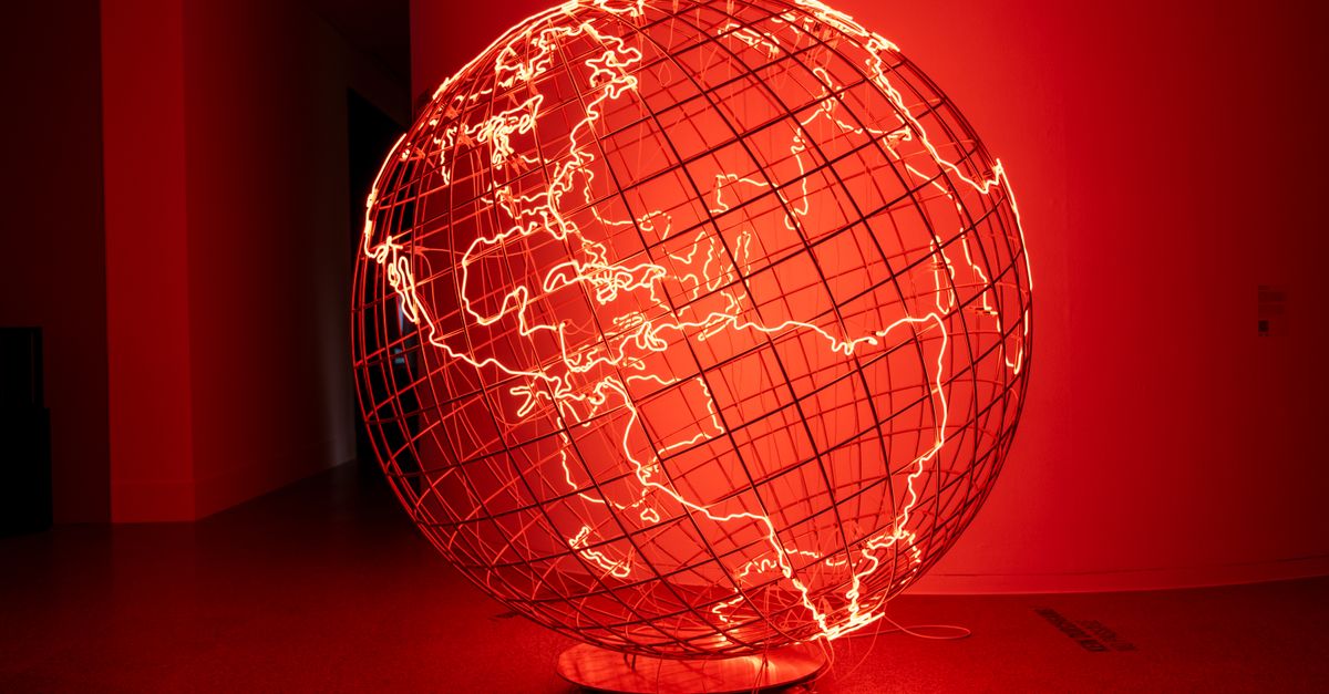 Concept art of a Hycean world with a glowing red dwarf star