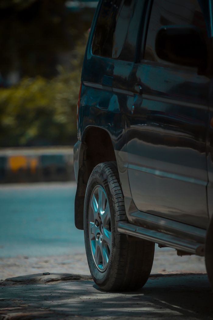 SUV wheel and tyre detail on a city street