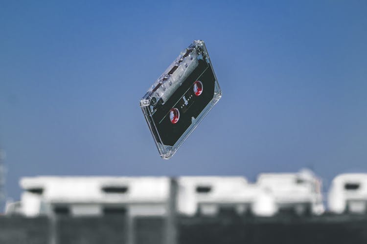 Black Cassette Tape In Mid-air