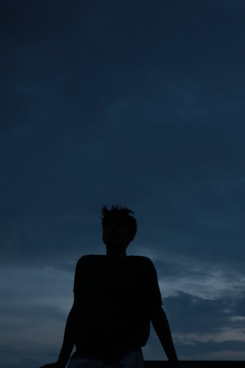 Silhouette of a Man in the Evening