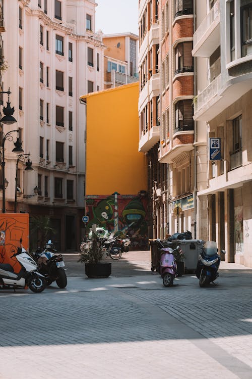 Scooters in a Narrow Alley