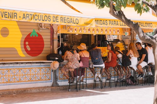 Tourists Eating Local Fast Food