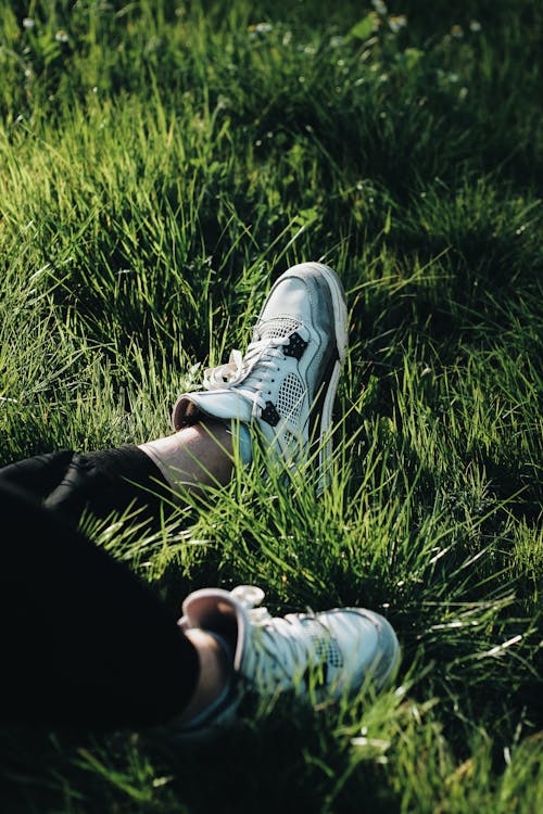 Free Human Foot on a Grass Stock Photo
