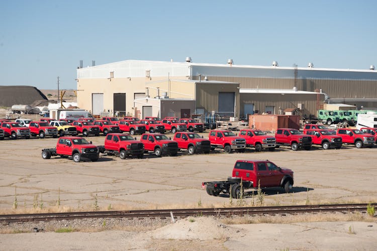 Red Pick-ups Near Warehouse