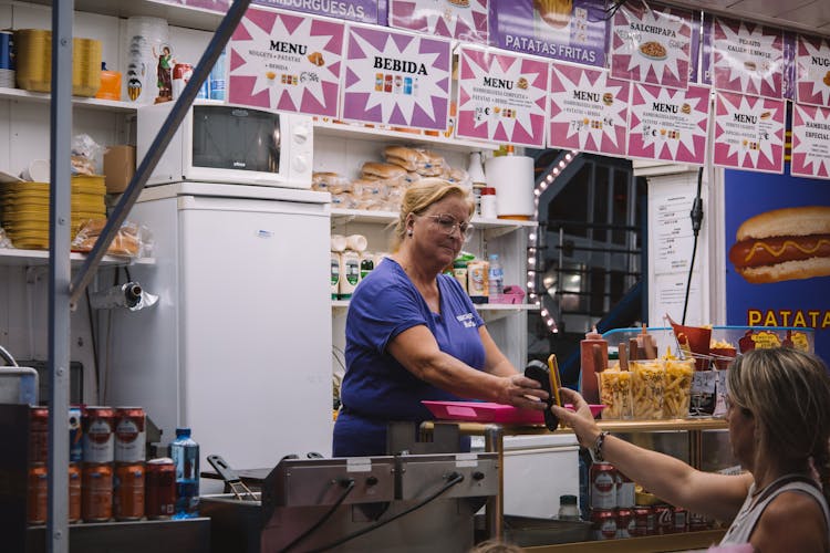 Paying With Cellphone In Food Bar