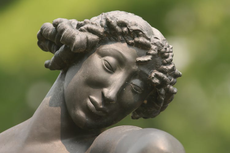 Close-up Of A Sculpture Of A Woman 