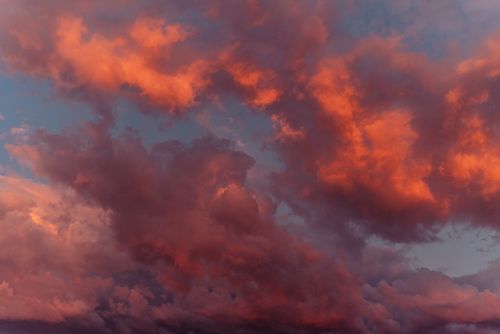 Free Breathtaking view of vibrant orange clouds during dusk, perfect for nature lovers. Stock Photo