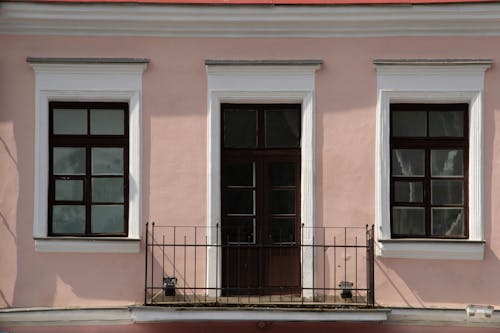 Pink Facade of a Residential Building 