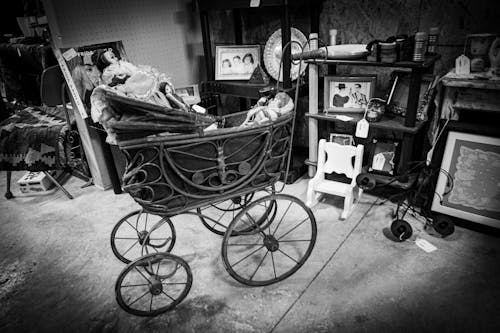 Free stock photo of antique shop, baby carriage, baby dolls