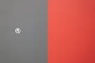 Crossed Hand on Gray and Red Background