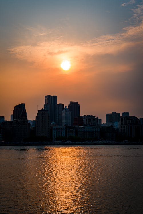 City on Sea Coast at Sunset