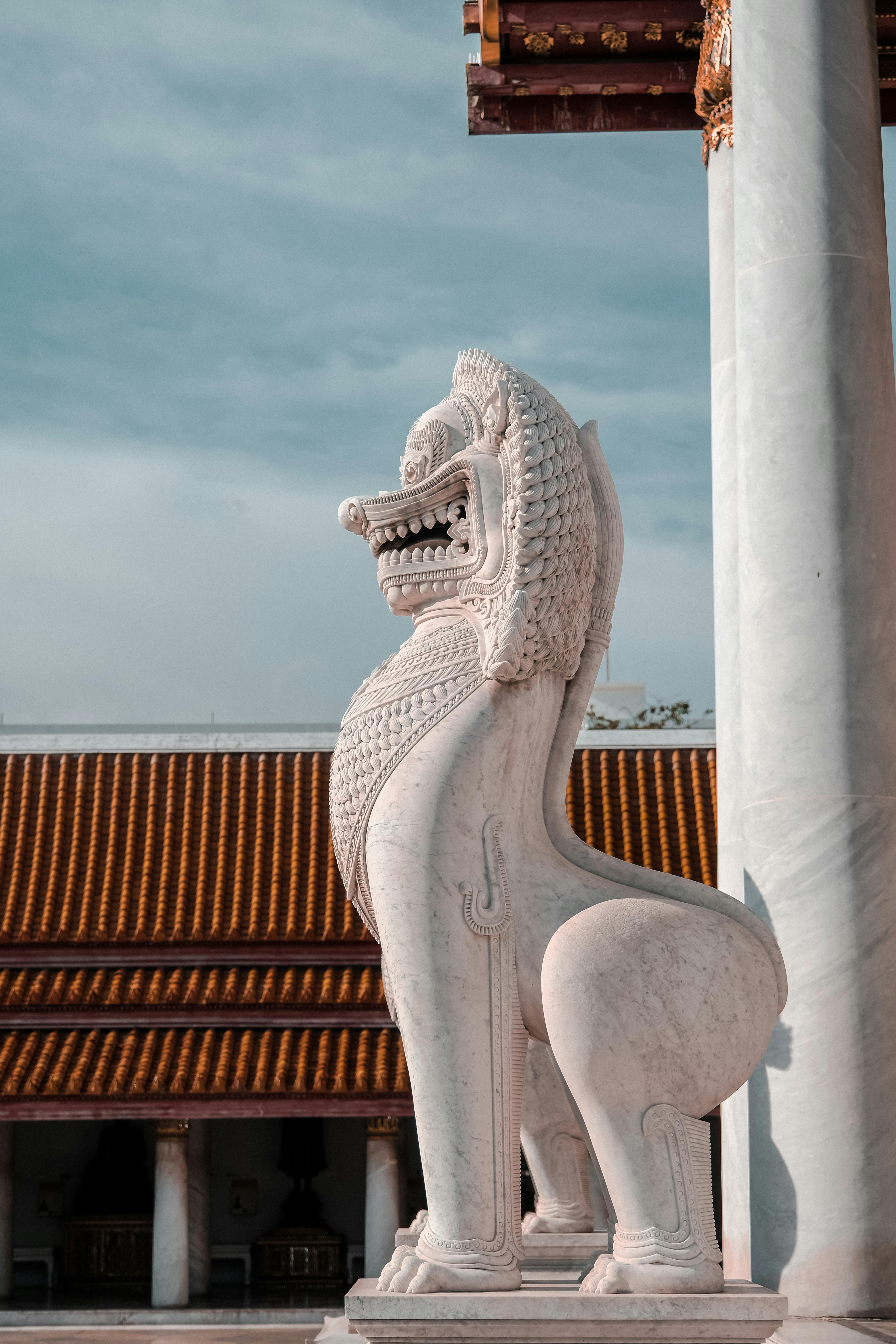 A Statue Of A Lion In Front Of A Building Free Stock Photo   Free Photo Of A Statue Of A Lion In Front Of A Building 