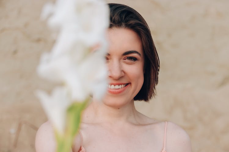 Smiling Woman With Flower