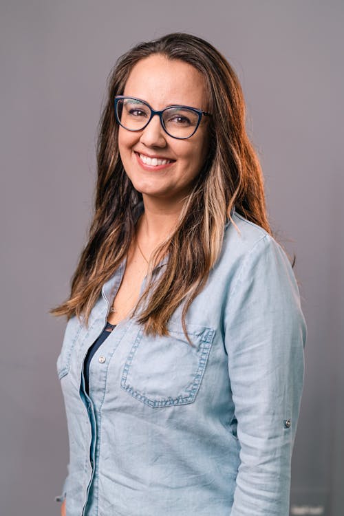 Smiling Woman in Shirt and Eyeglasses