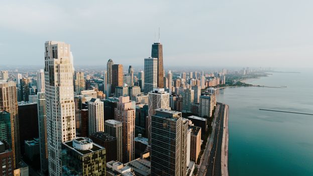 Stunning aerial view of the Chicago skyline along Lake Michigan, showcasing tall skyscrapers and beautiful skyline.