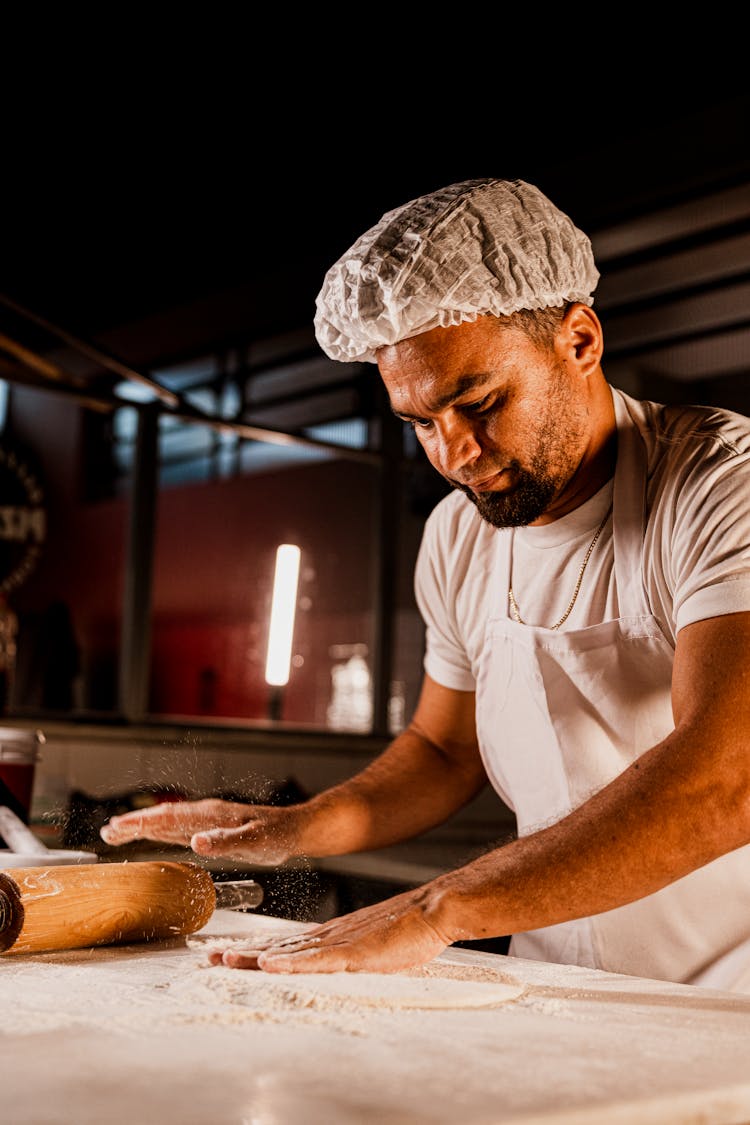 Pizzaiolo Making Pizza