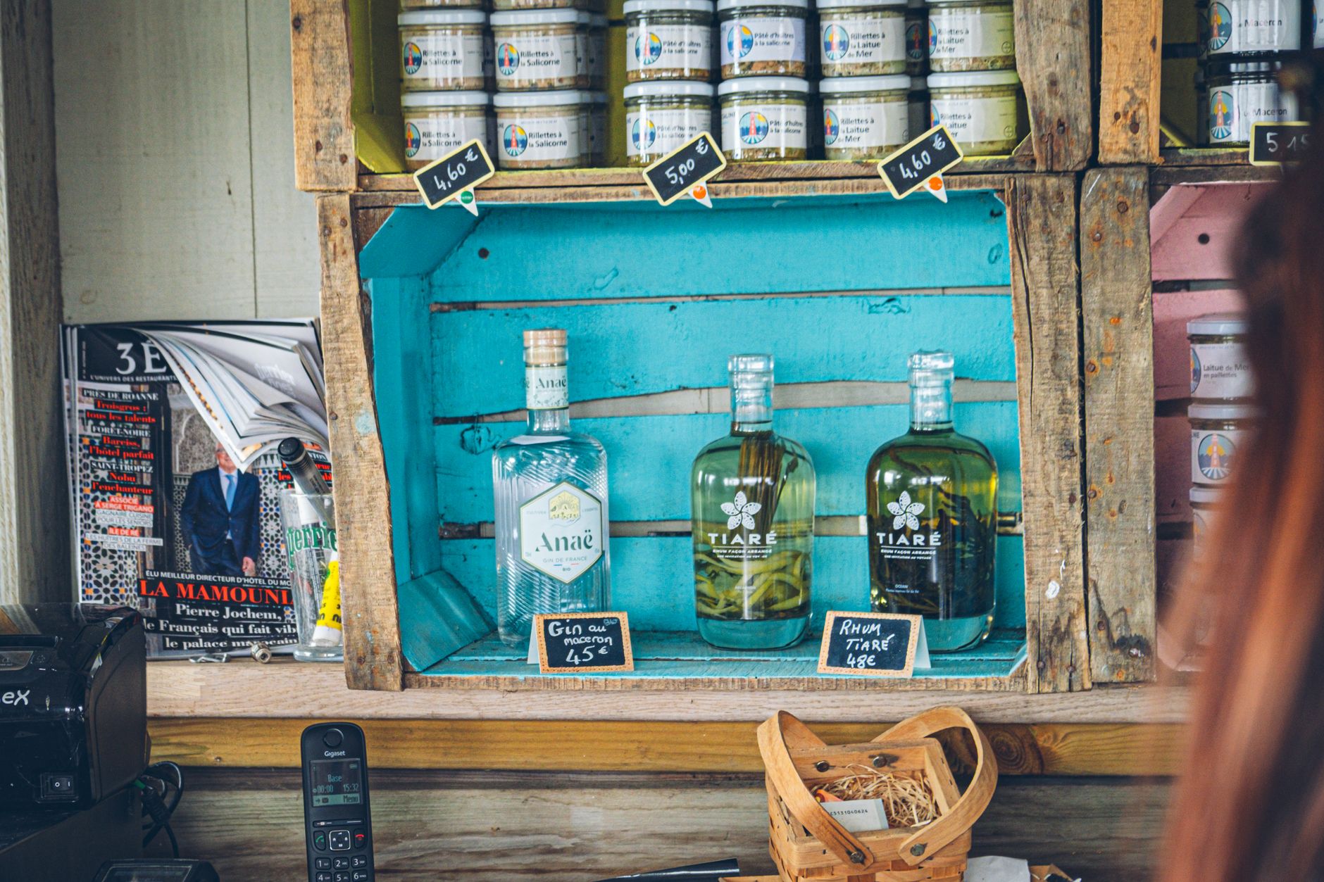 Coffee liqueur bottle stored on kitchen shelf away from light