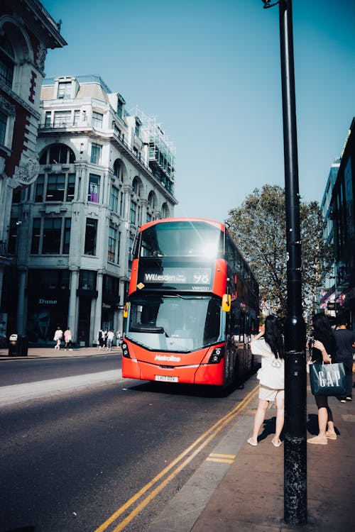 Red Double-Decker Bus on a Street in London, England