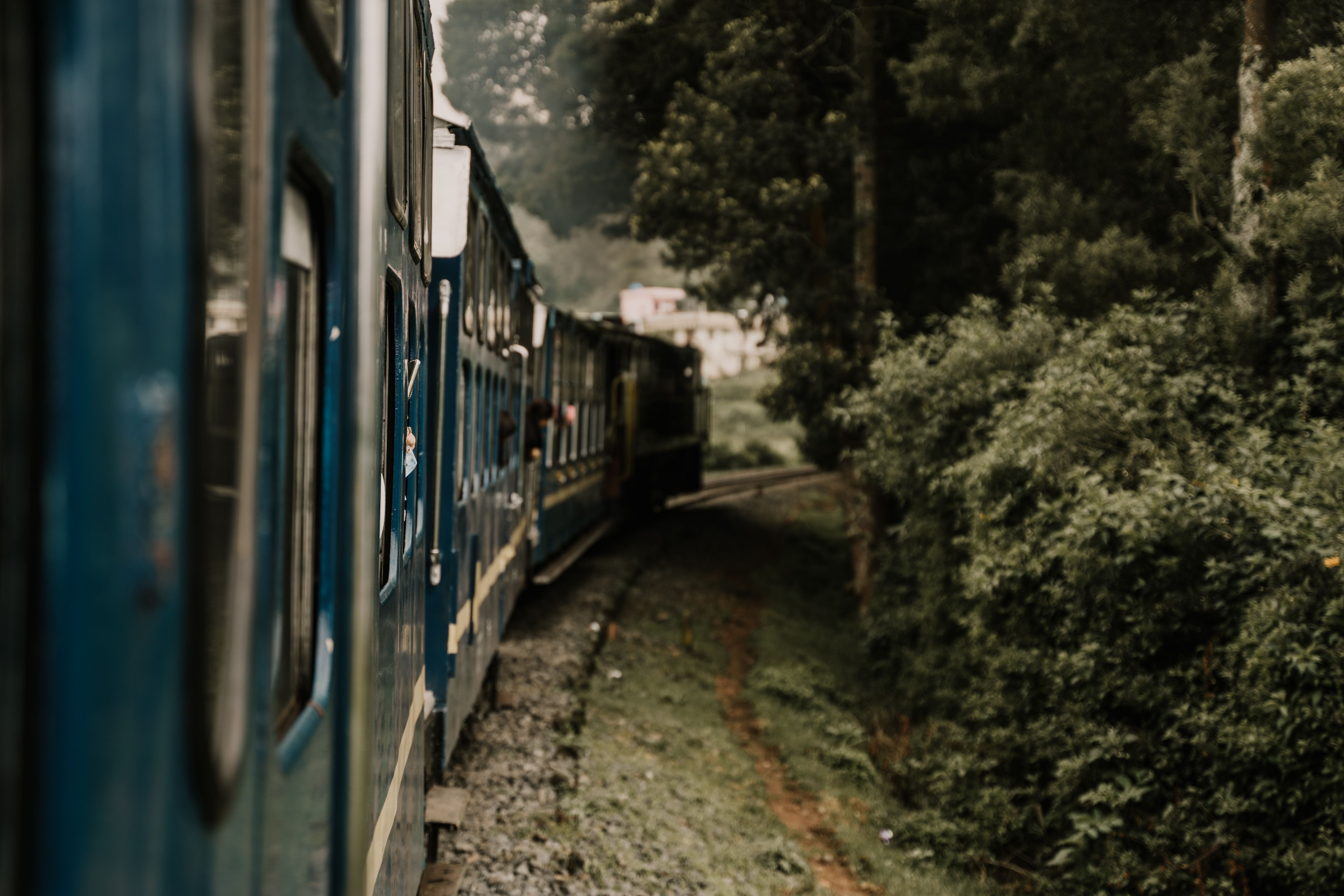 Passenger Train at a Tracks Bend · Free Stock Photo
