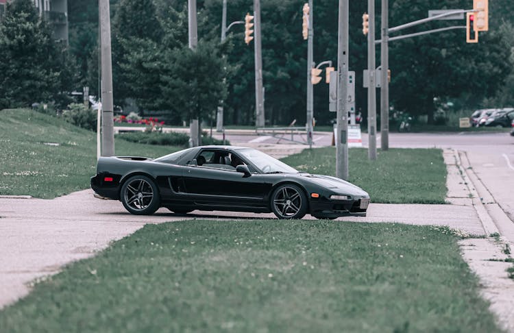 Black Honda NSX Car Parked On A Roadside