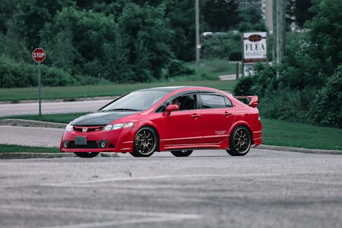 Foto profissional grátis de automobilístico, carro esportivo, carro vermelho