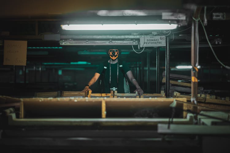 Man Wearing A Mask In A Factory 