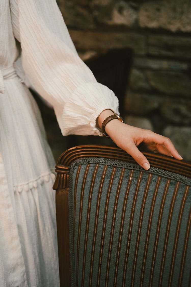 Woman Hand On Chair