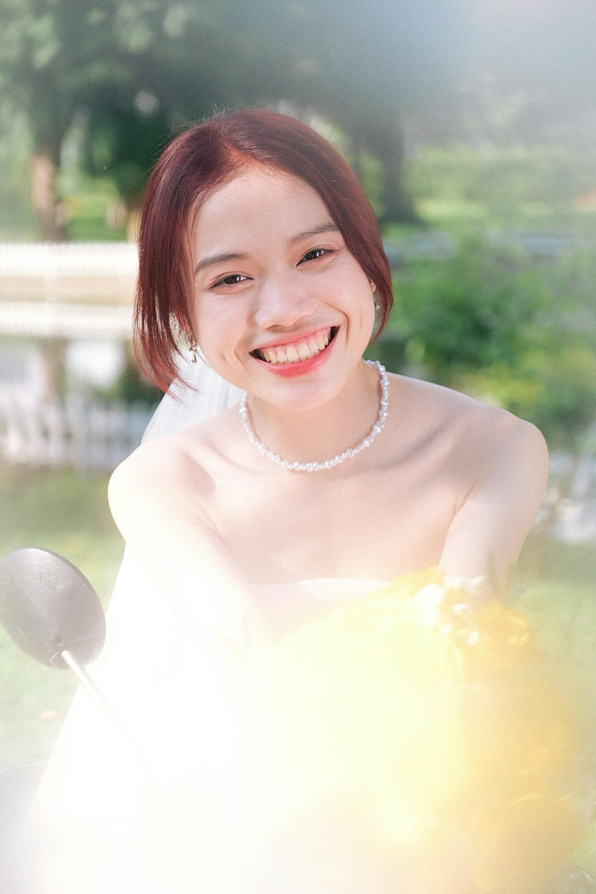 portrait of a bride with a bouquet of flowers in blur