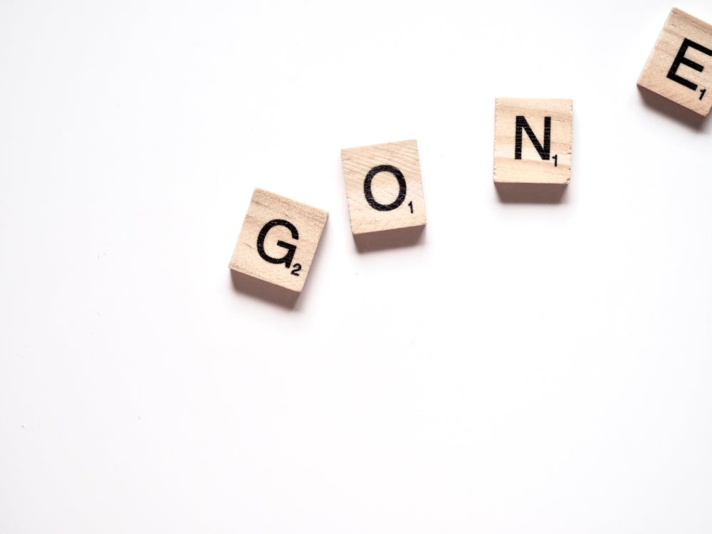 Free Gone Scrabble Pieces Stock Photo