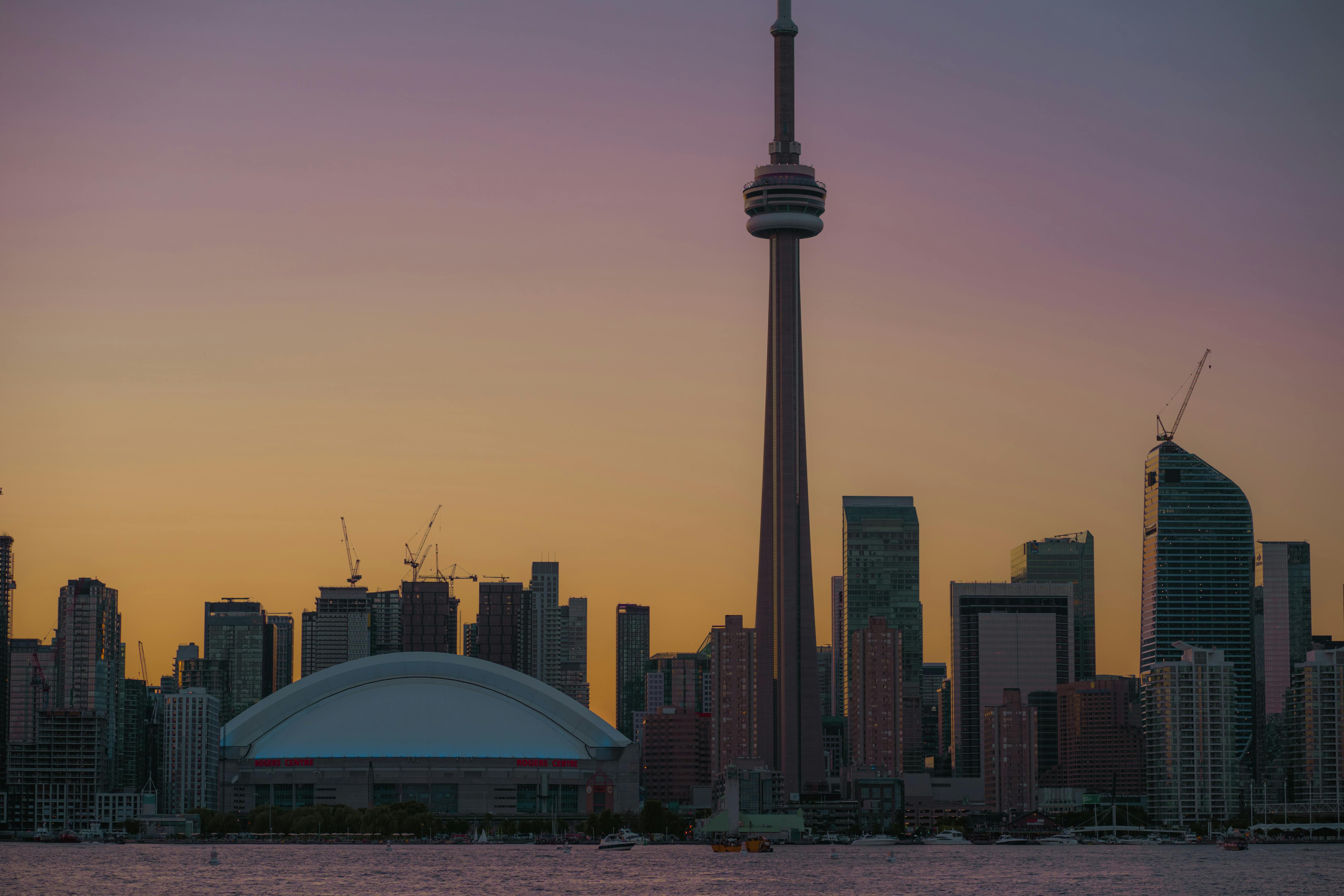 sunset view of cn tower from toronto island