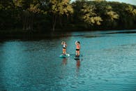 Two Girls paddling on Toronto Island