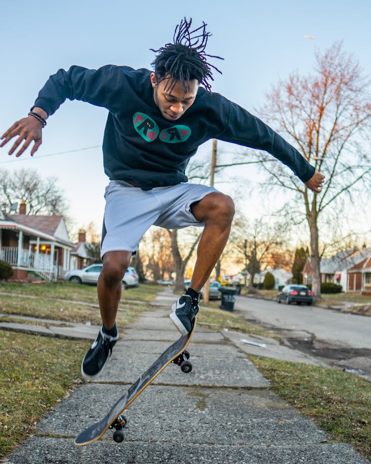 Man Doing Skateboard Stunt