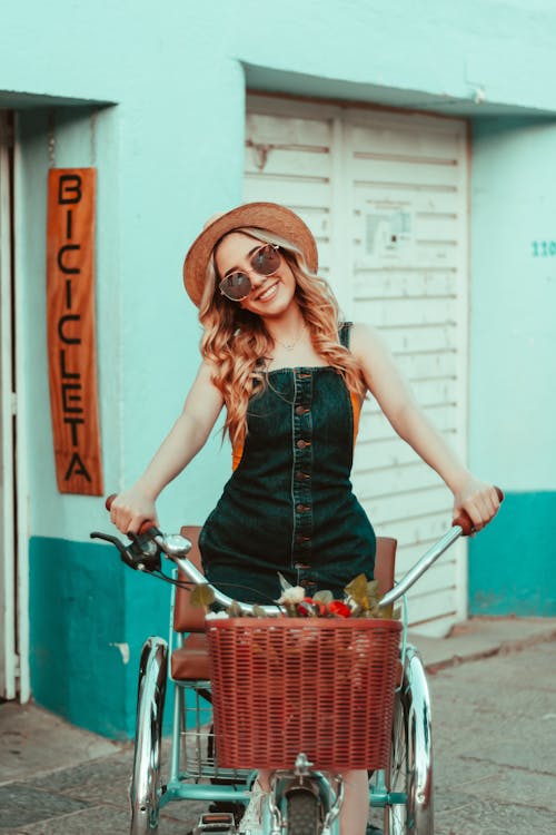 Woman on a Bicycle on a Street