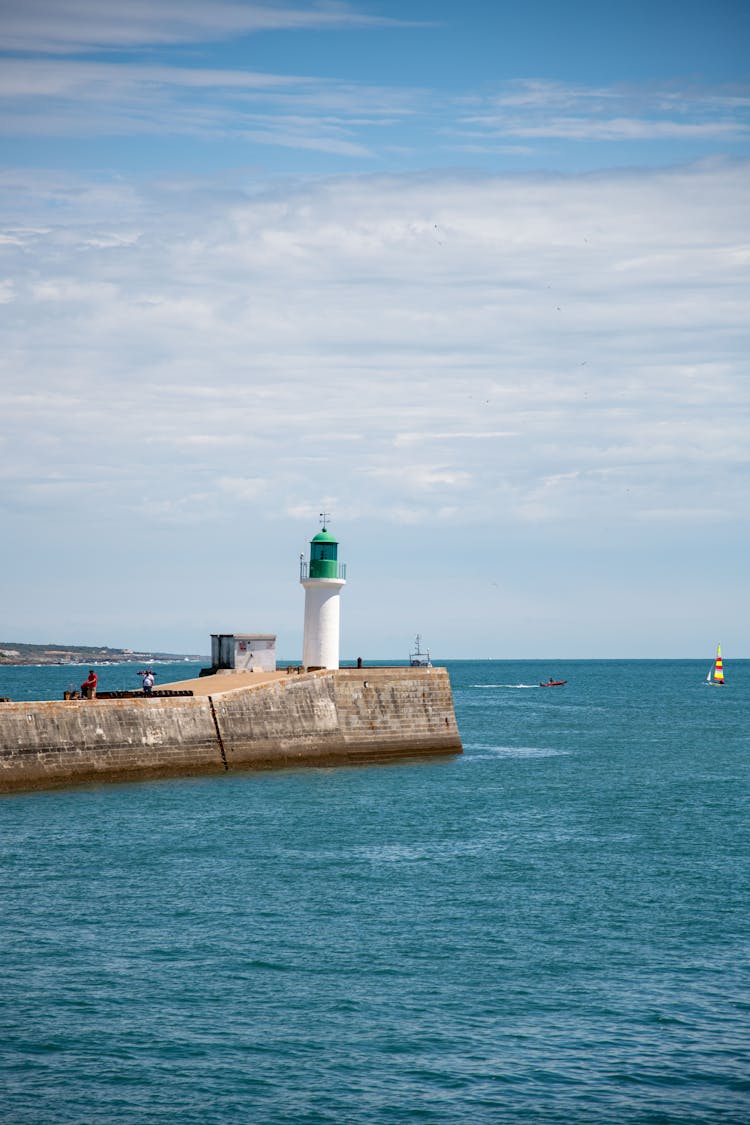 Lighthouse By The Sea