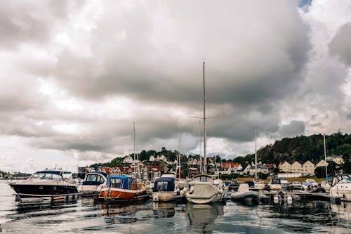 Clouds over over Motorboats on Shore