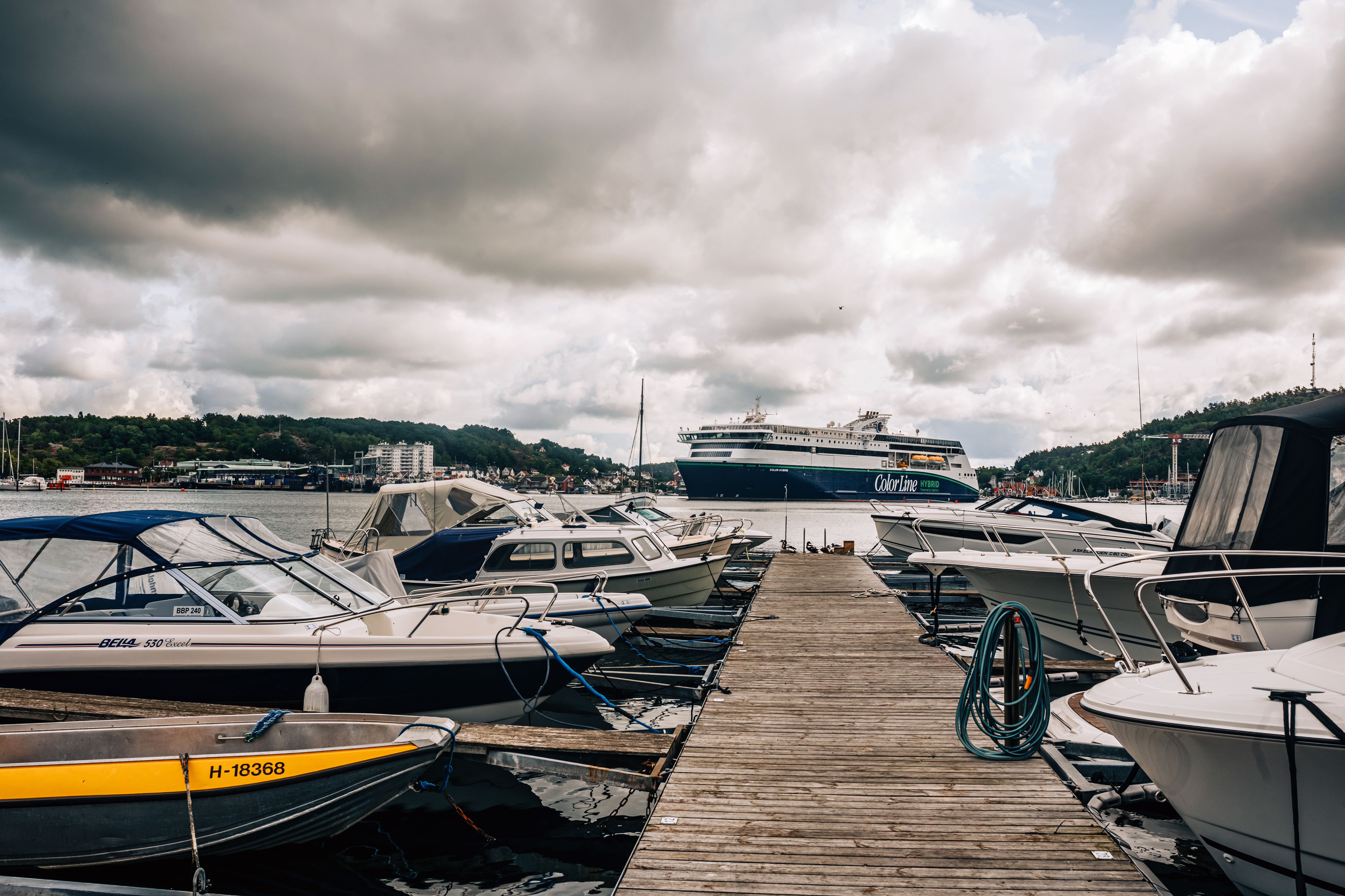 Pier with Moored Motorboats · Free Stock Photo