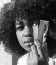Grayscale Photography of Woman Holding a Broken Mirror