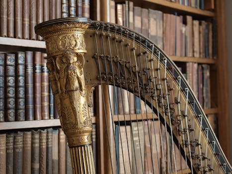 Close-up of a golden harp in a vintage library with classic bookshelves.