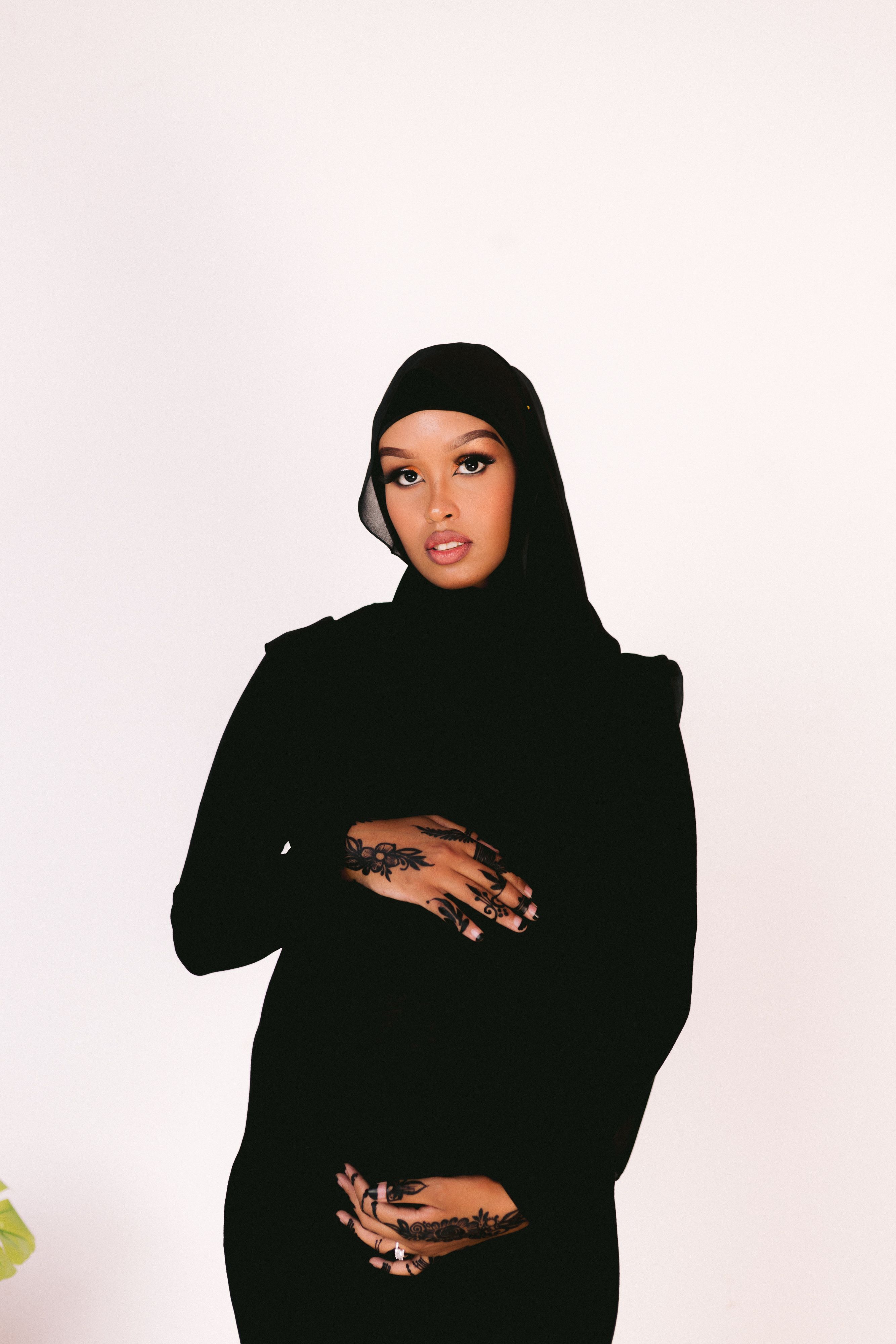 A Woman Wearing a Headscarf · Free Stock Photo