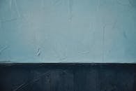 纹理墙艺术以复古风格与蓝色色调的对比，展现了丰富的细节