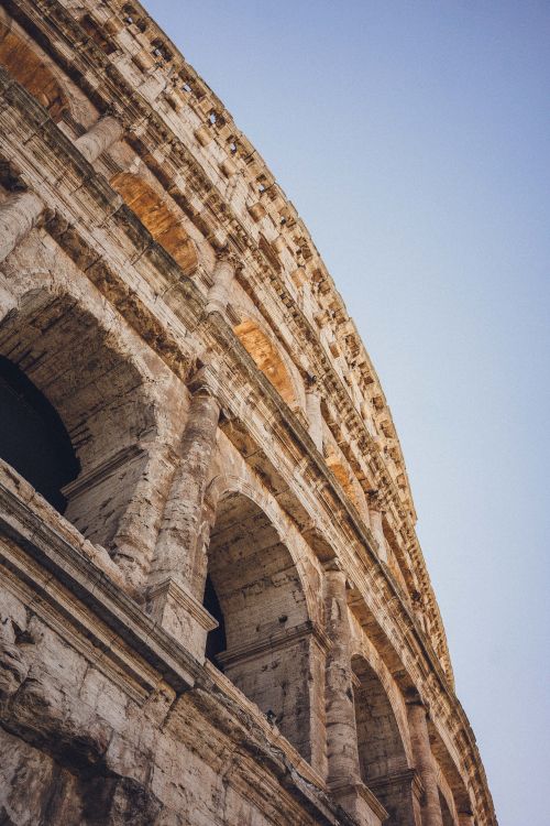 Free Close-up of the ancient Colosseum in Rome, Italy, showcasing its historical architecture. Stock Photo